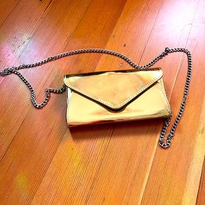 Patent gold structured purse.  perfect for the holidays